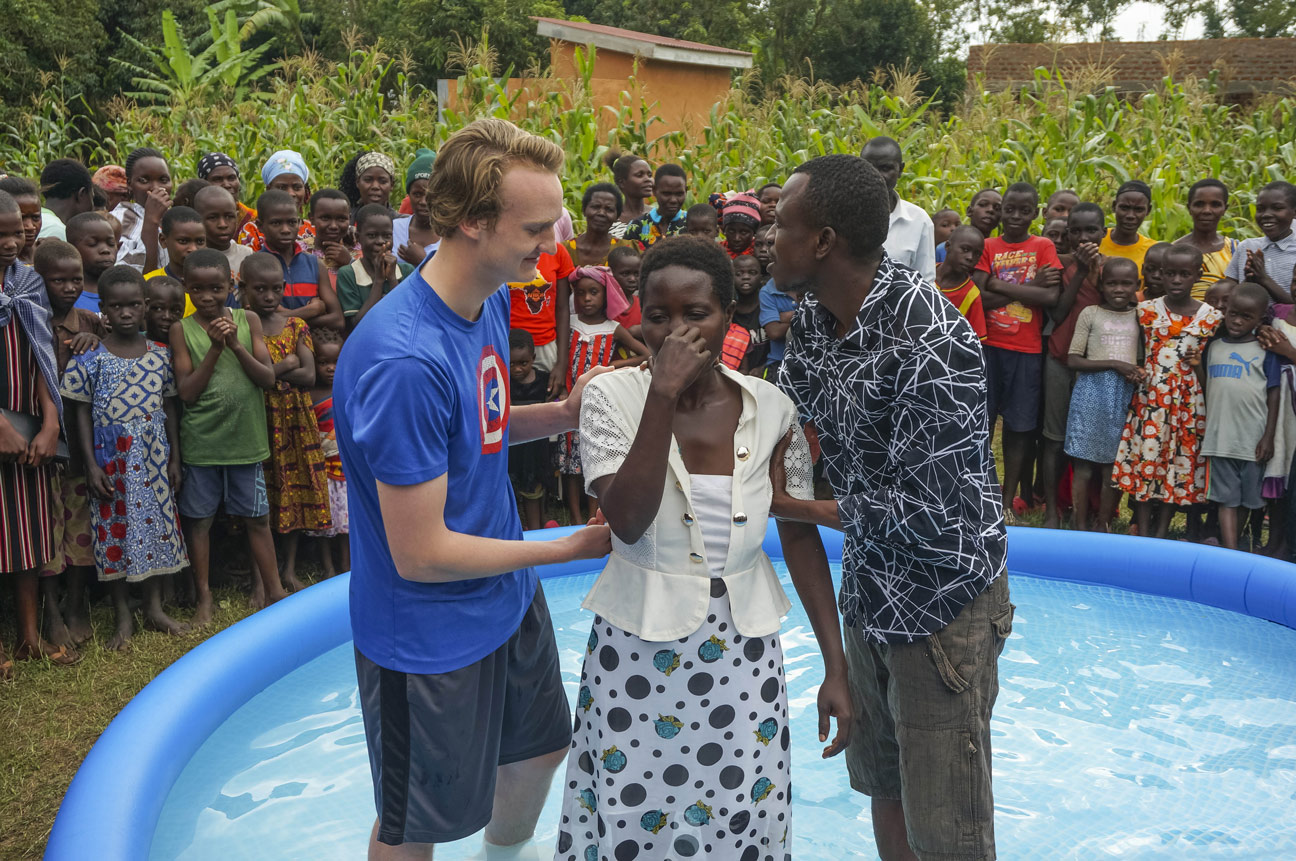 Jude and another local pastor getting ready to baptize